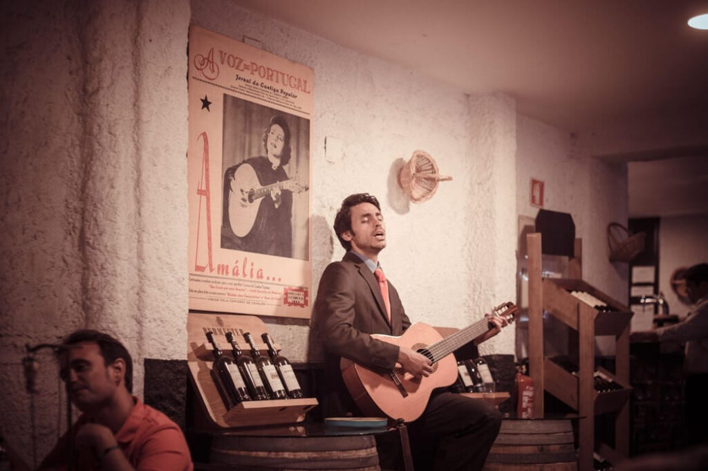artist playing guitar